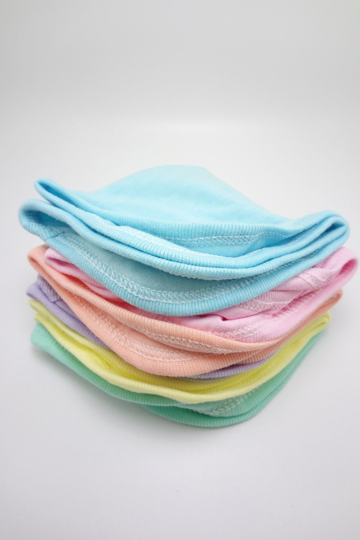 Stack of cloth diaper inserts.